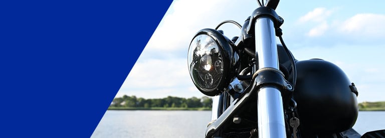 close up of motorcycle headlamp banner