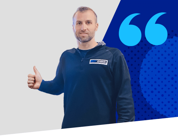 josh from fivestar powersports standing in blue shirt giving the thumbs up