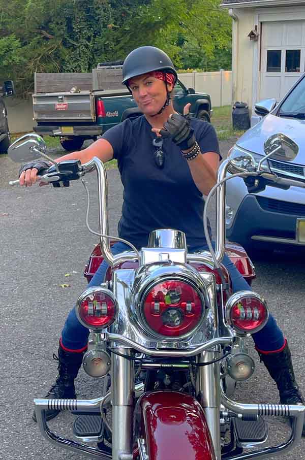 Motorcycle rider Raven on her bike