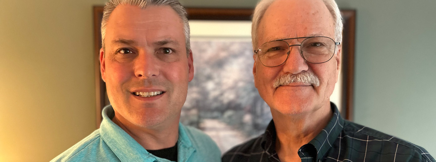 Photograph of Rob and Rick Young looking at the camera