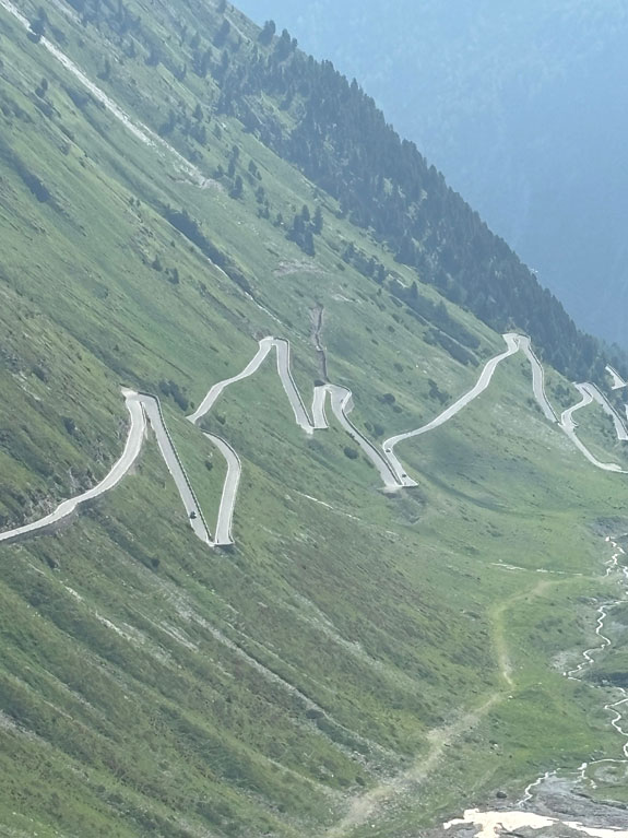Photo of a winding path through the mountains