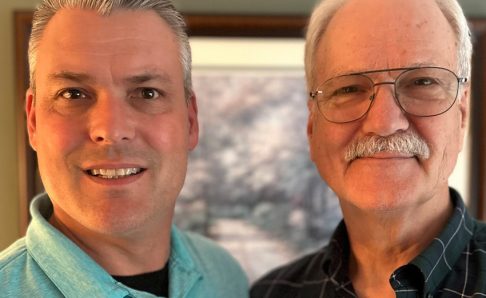 Photograph of Rob and Rick Young looking at the camera